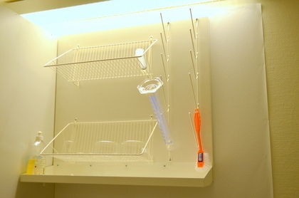 Labratorieglas, vägghängt diskställ