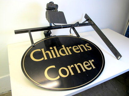 Butiksskylt med belysning