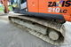 Bandgrävare Hitachi 210