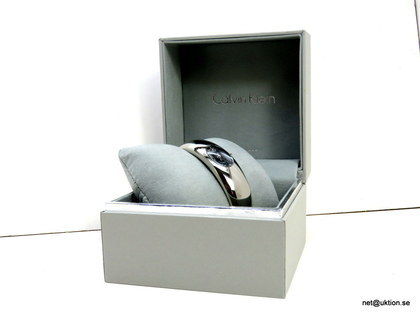 Damklocka, Calvin Klein