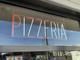 Skylt Pizzeria
