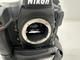 Systemkamera Nikon med objektiv och väska