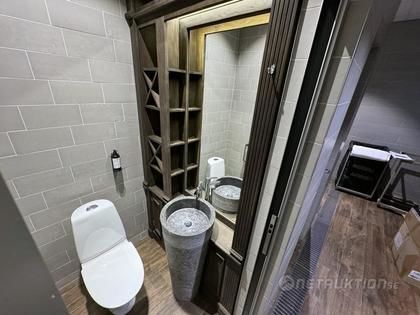 Badrumsinredning med stenhandfat & blandare