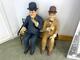 Sittande figurer av Helan & halvan & poster