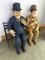 Sittande figurer av Helan & halvan & poster