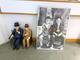 Sittande figurer av Helan & halvan & poster