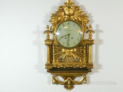 Förgylld väggpendyl Förgylld väggpendyl